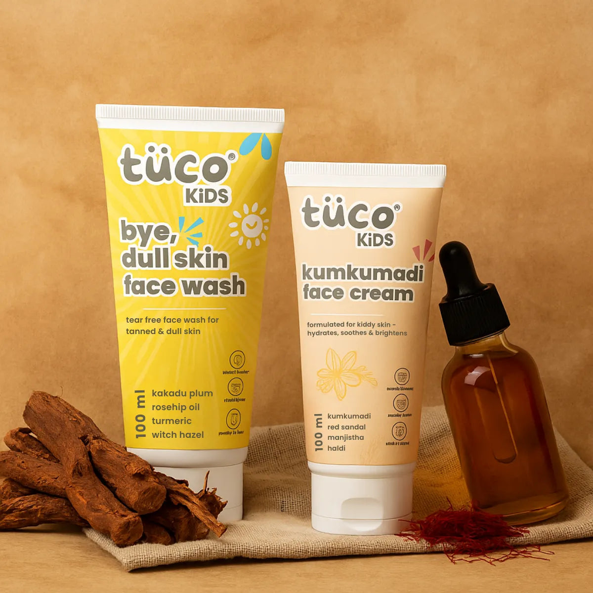 Tuco Kids Kumkumadi range including face wash, face cream, and a dropper bottle on a beige background.
