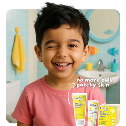 Tuco Kids Dull Skin Kit for Kids - smiling boy with bye dull skin lotion and face cream sunscreen SPF 30 for no more dull patchy skin