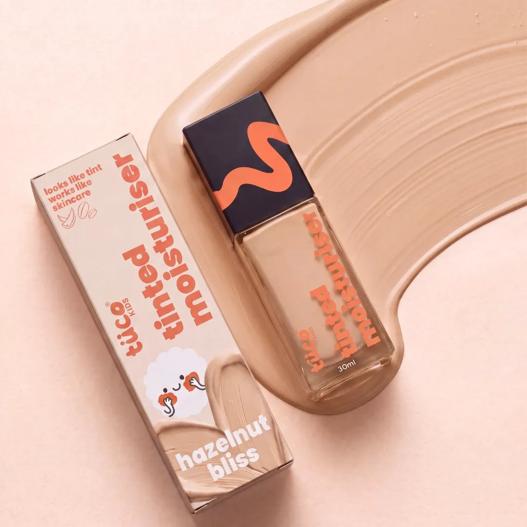 Tinted Moisturiser - Hazelnut Bliss — box and bottle with swatch | Tuco Kids
