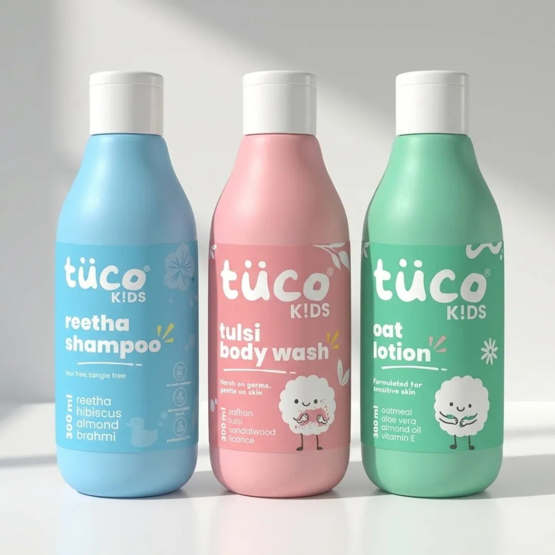 Three bottles of tüco Kids products on a white background