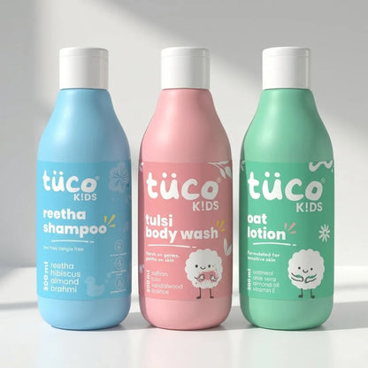 Three bottles of tüco Kids products on a white background